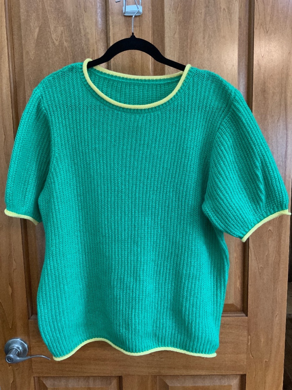 Women’s green sweater with yellow trim medium